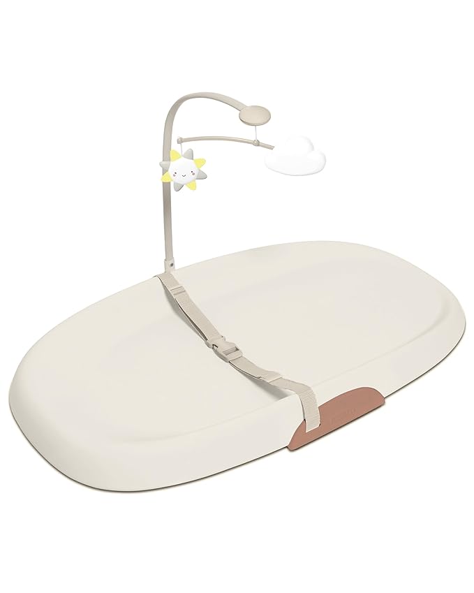 Skip Hop Baby Changing Pad Nursery Style Wipe-Clean Contoured with Cushioned Foam, Non-Skid Base, Built-in Safety Belt & Tuck-Away Toy Bar, Oat