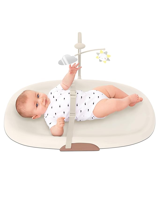Skip Hop Baby Changing Pad Nursery Style Wipe-Clean Contoured with Cushioned Foam, Non-Skid Base, Built-in Safety Belt & Tuck-Away Toy Bar, Oat