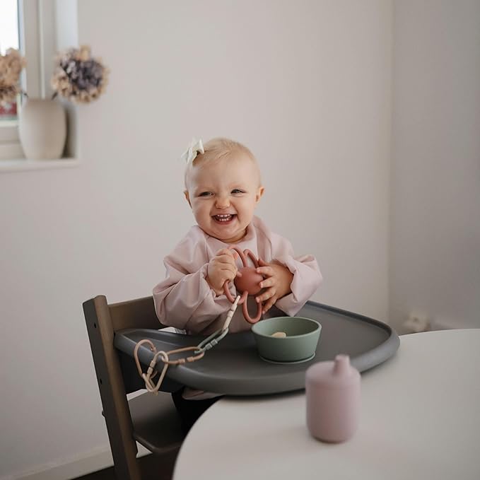 mushie Long Sleeve Baby Bib | Water Resistant Adjustable Fit for Ages 6-24 Months