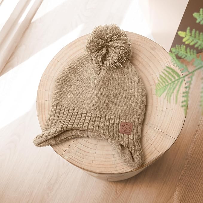 Baby Beanies, Baby Hats for Boys, Girls - Cute Toddler Winter Hat, Soft & Stretchy Beanies for Infant, Newborn 0-6 Months, Cozy & Warm with Earflap Muff & Pom (Taupe, S)